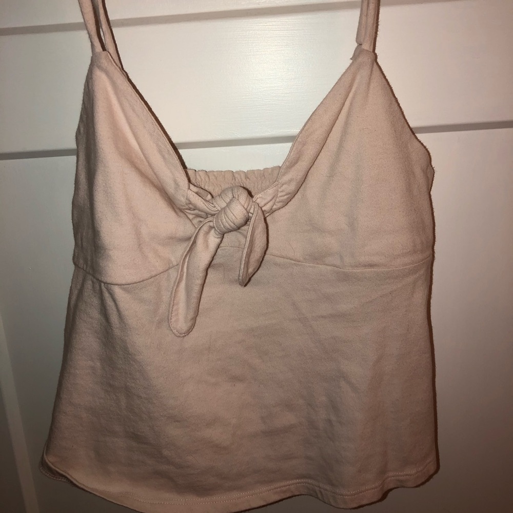 pale pink top with tie knot